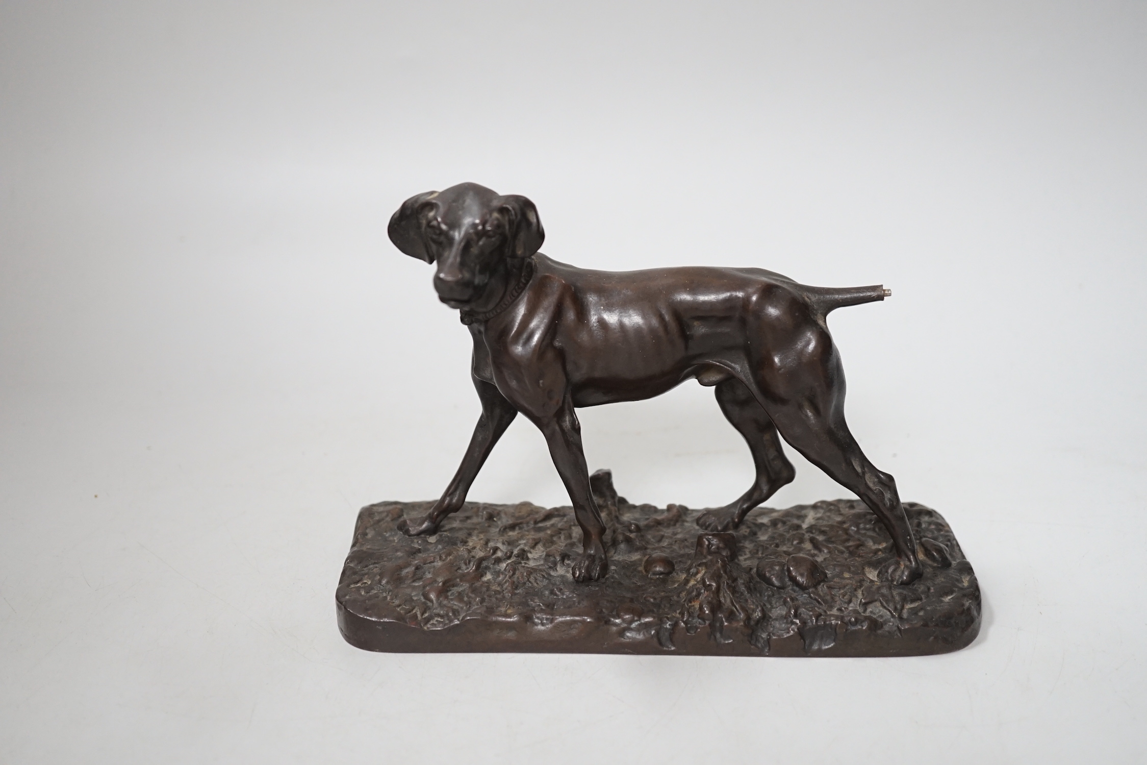 After Pierre-Jules Mêne (1810 – 1879) a patinated cast iron hound and a similar small bronze figure of a greyhound, the largest 18cm wide